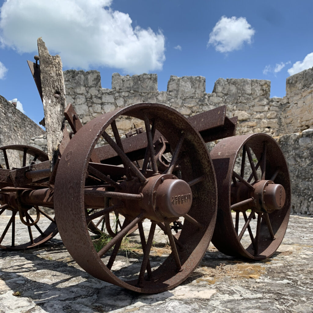 Old restored cannon inside the Fort of San Felipe; built in the early 1700s to defend the Spanish colonials and Mayan locals against the invading pirates from the UK and other parts of the world.