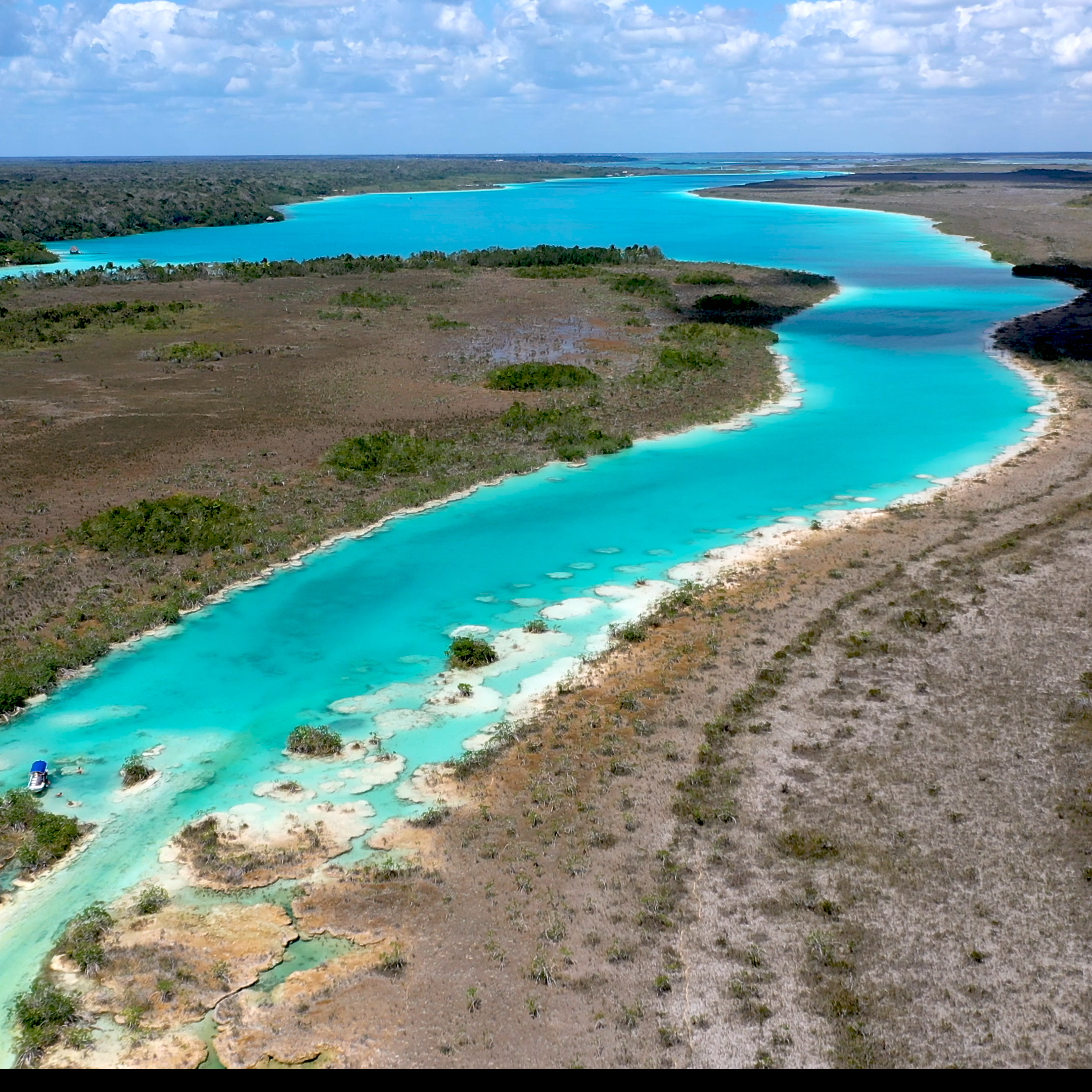 Aerial view of the Bacalar Lagoon, "The Lagoon of 7 Colors", considered the "Mexican Maldives" by Forbes Magazine.